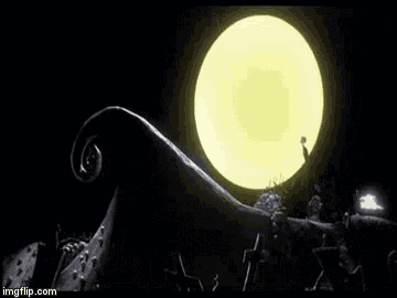 a nightmare before christmas scene with a full moon and a skeleton standing on a hill .