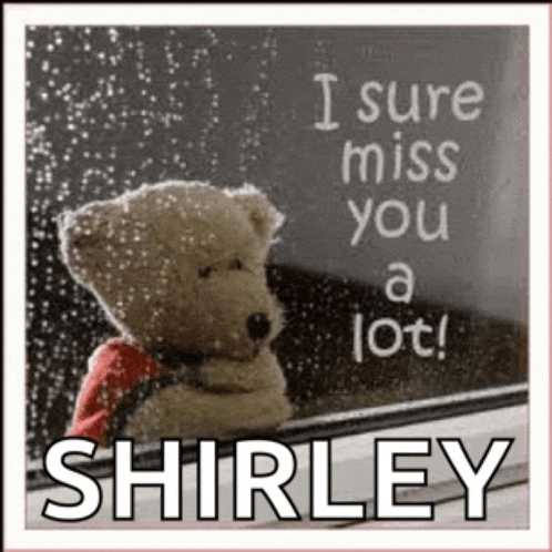 a teddy bear is looking out a window with the words " i sure miss you a lot shirley " on the bottom