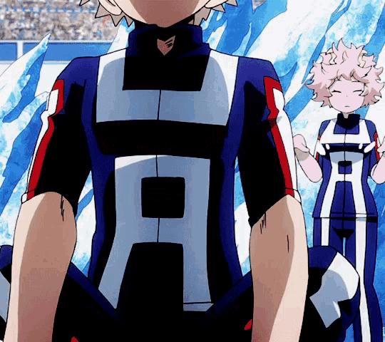 a person wearing a blue and white uniform with the letter h on the front