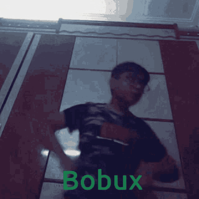 a blurred image of a person with the word bobux on the bottom