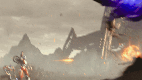 a blurred image of a plane that says ' tnt ' on the tail