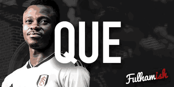 a man in a white shirt stands in front of a sign that says que