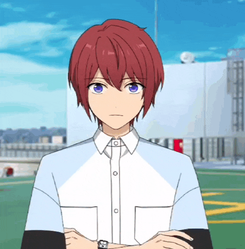 a man with red hair and blue eyes is wearing a white shirt