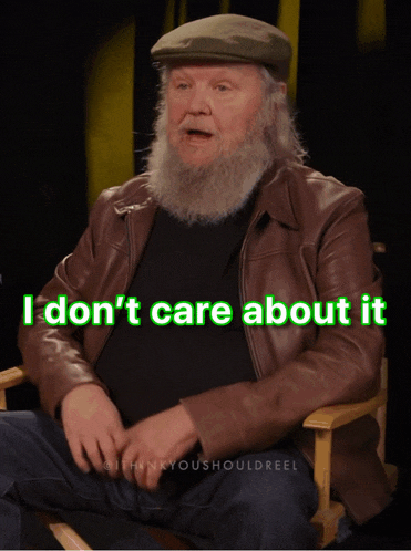 a man with a beard is sitting in a chair with the words i don 't care about it below him