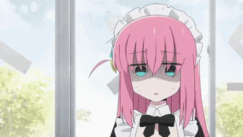 a girl with pink hair and a maid outfit is standing in front of a window with a sad look on her face .