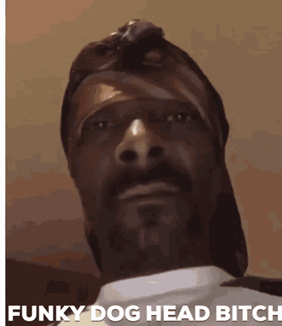 a close up of snoop dogg 's face with the words funky dog head bitch below him