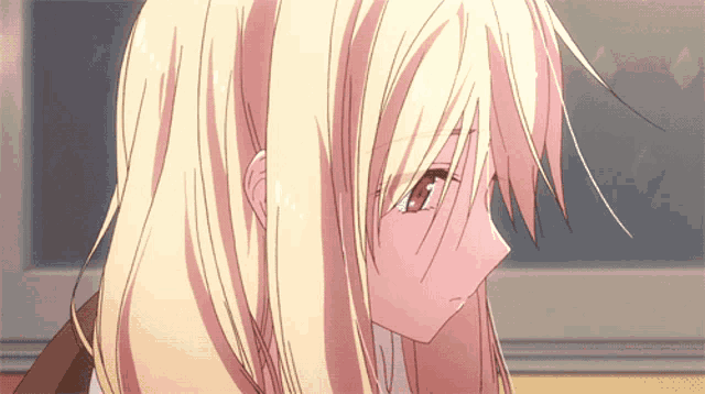 a close up of a blonde anime girl with tokyo mx in the corner