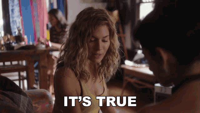 a woman sitting next to a man with the words " it 's true " behind her