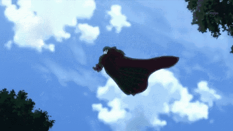 a man in a red cape is flying through the sky