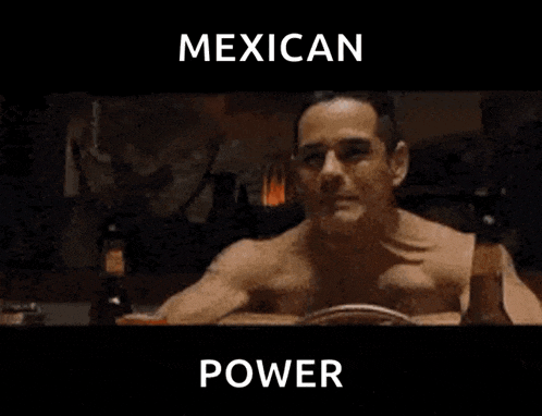 a man without a shirt is standing in a dark room with the words mexican power above him