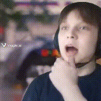 a young boy wearing headphones and a blue shirt is thinking