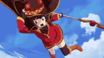 a girl in a red dress is flying through the air with a cane .
