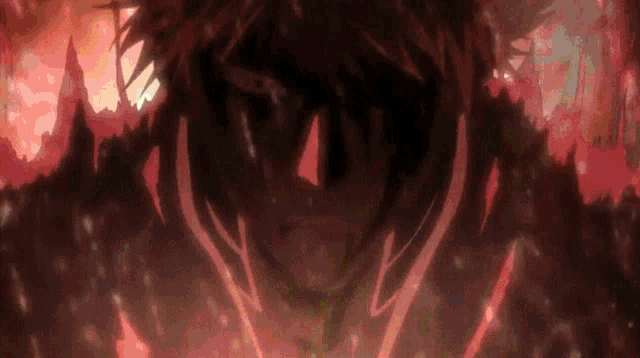 a close up of a person 's face surrounded by a red background