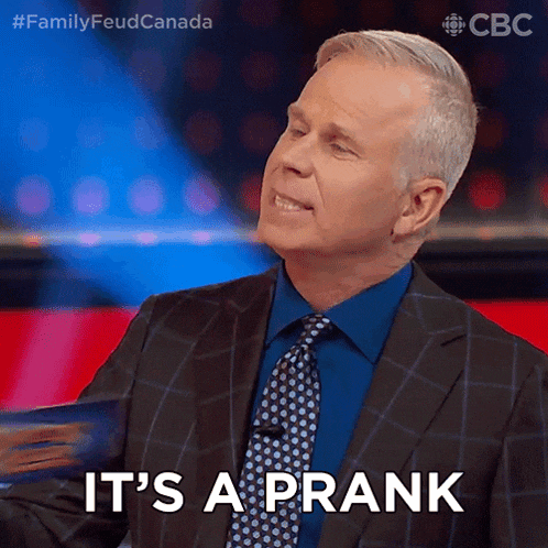 a man says it 's a prank while wearing a suit and tie