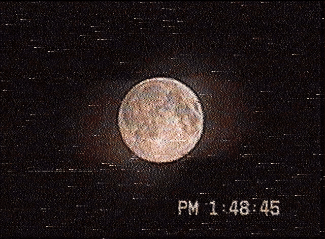 a picture of a full moon with the time 1:48 45