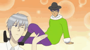 a man in a green sweater sits next to another man