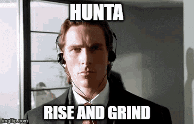 a man in a suit and tie is wearing headphones and a meme .
