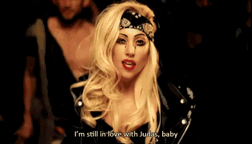 lady gaga is wearing a bandana and says i 'm still in love with judas , baby