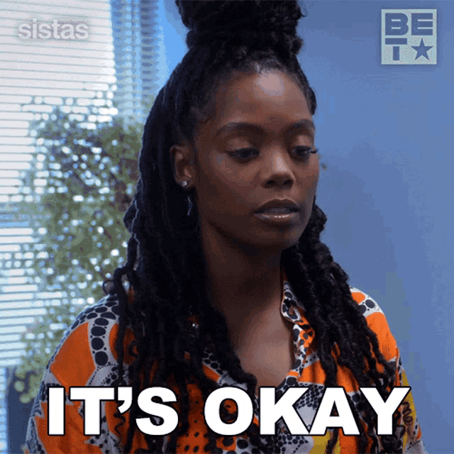 a woman with dreadlocks says it 's okay on a screen