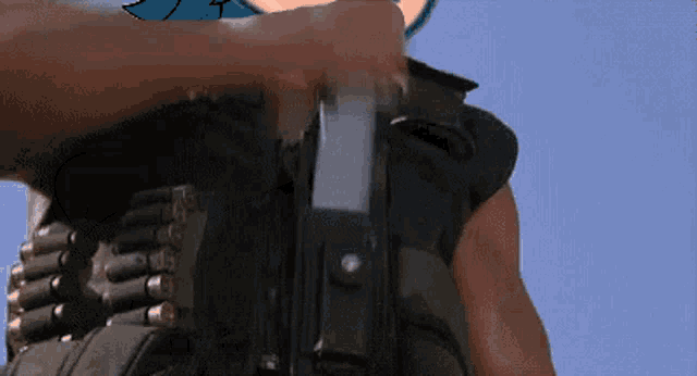 a cartoon character is holding a gun with a blue background