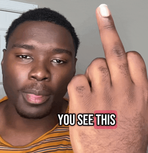 a man giving the middle finger with the words " you see this " below him