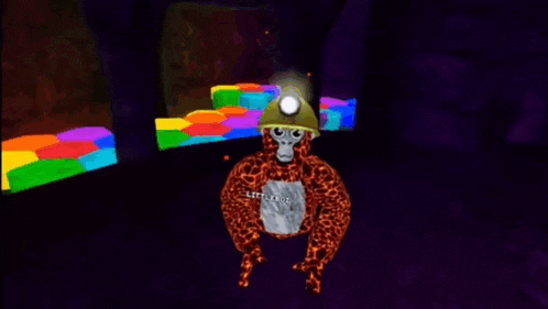 a cartoon of a gorilla wearing a hard hat and holding a rock with the word littleboy on it .