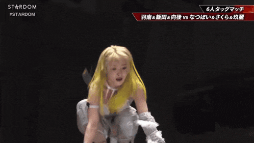 a wrestling match is being broadcasted on stardom
