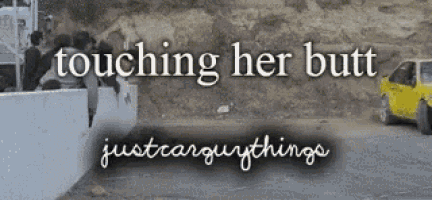 a sign that says touching her butt with a yellow car in the background