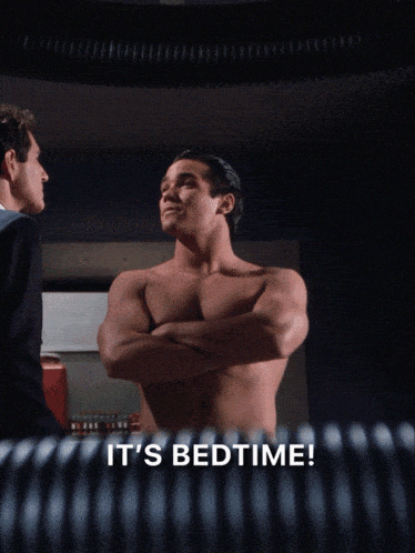 a shirtless man with the words it 's bedtime on the bottom