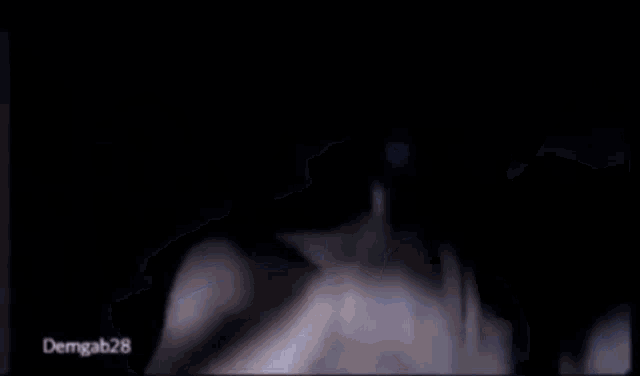 a blurred image of a person with the name demgab28 on the bottom right
