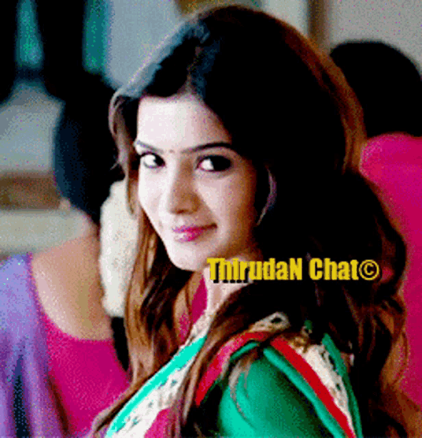 a close up of a woman 's face with the words thiruran chat on the bottom