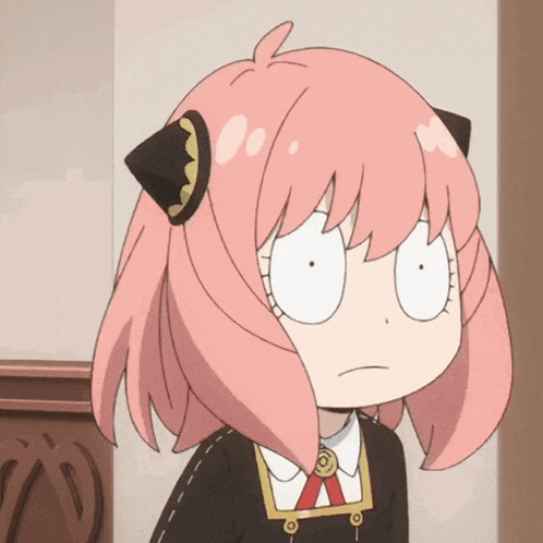a cartoon girl with pink hair is making a funny face
