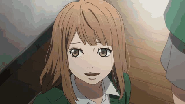 a close up of a girl 's face with orange hair