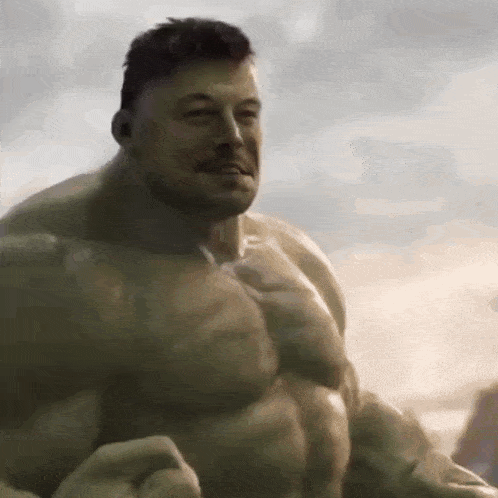 a close up of a man dressed as the hulk with a beard