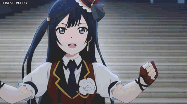 a girl with long black hair is standing on a set of stairs