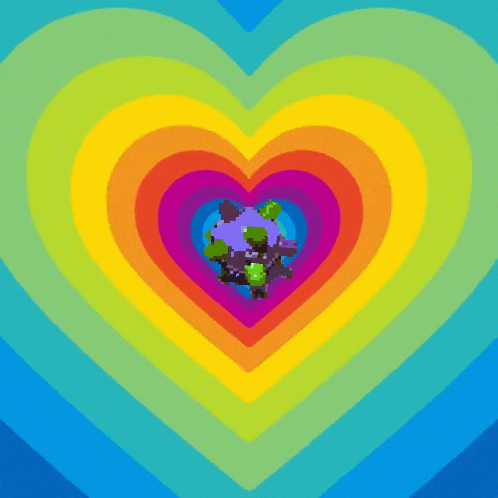 a rainbow colored heart with a purple object in the middle
