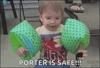 a little boy wearing a shirt that says ' porter is safe '
