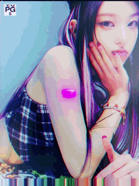a girl with purple hair has a bandage on her arm that says tfx pg s