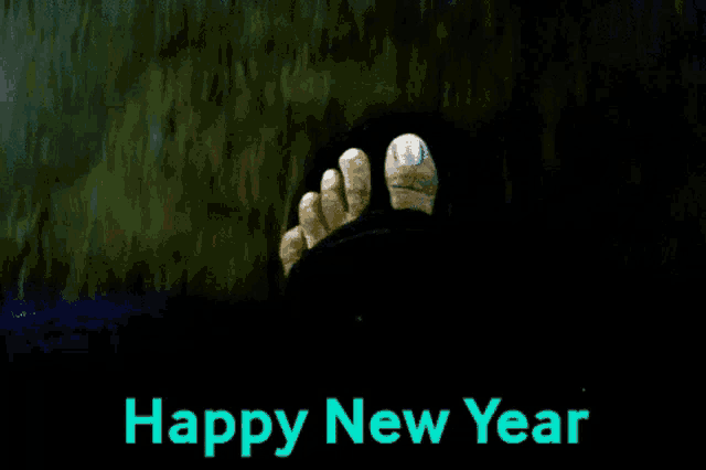 a happy new year greeting card with a foot sticking out of the dark