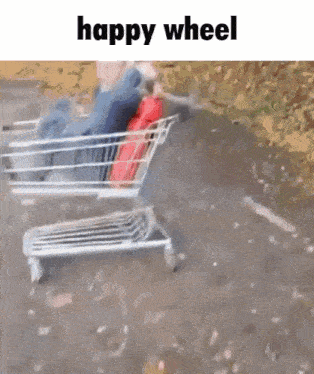 a shopping cart is being pushed down the road by a happy wheel .