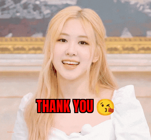 a woman with blonde hair is smiling with a thank you emoji behind her