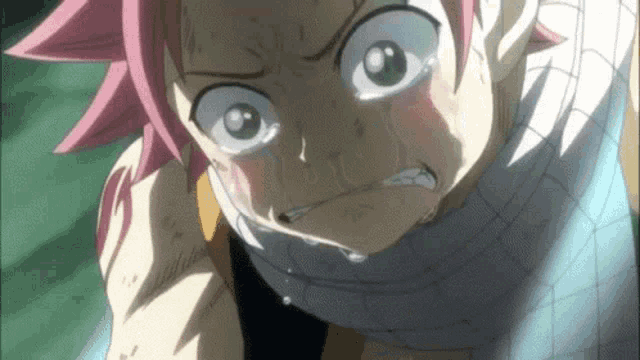 a close up of a cartoon character with pink hair crying