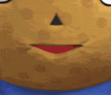 a close up of a cartoon character 's face with a blue shirt on