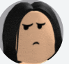 a close up of a cartoon character 's face with a sad expression on it .