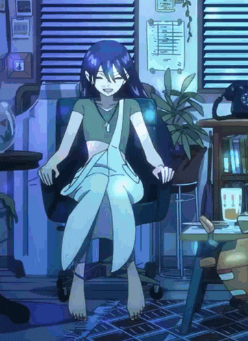 a girl is sitting in a chair with her legs crossed