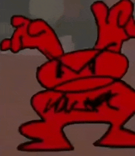a close up of a red cartoon character with an angry look on his face and arms .