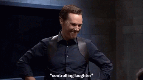 Controlling Laughter Benedict Cumber Batch GIF - Controlling Laughter Benedict Cumber Batch Laugh GIFs