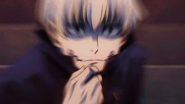 a blurry picture of a person 's face with blue hair