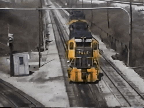 a yellow and black train that says pelle on the front