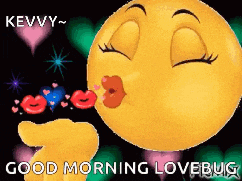 a smiley face is blowing a kiss and saying good morning lovebug